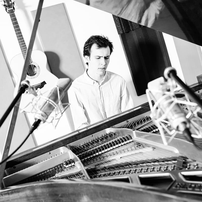 Shot of man at the piano playing