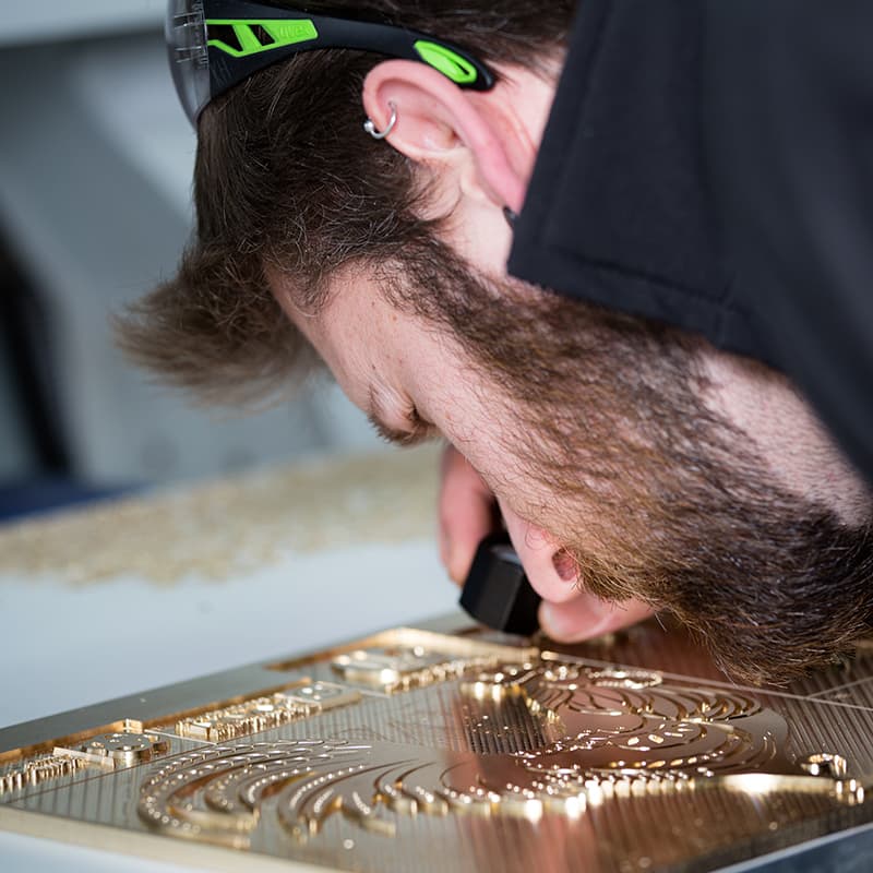 Portrait of man looking at work close up